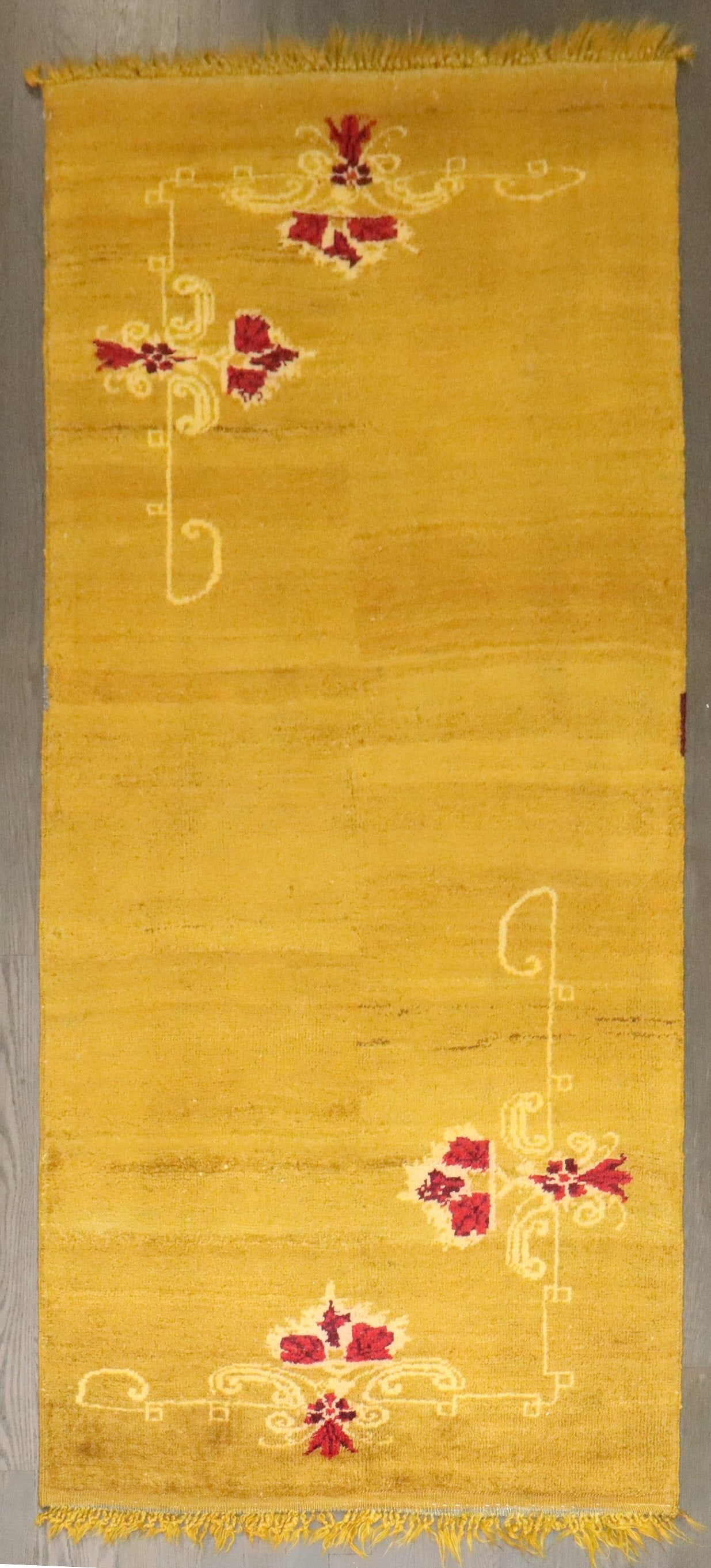 2' 10" x 6' 3" Hand Knotted Turkish Oushak Runner Floral: 2' 10" x 6' 3" Hand Knotted Turkish Oushak Runner Floral Hand-knotted Turkish Oushak runner with a luminous golden yellow field, soft abrash, and restrained floral motifs in brick red and ivory. The o