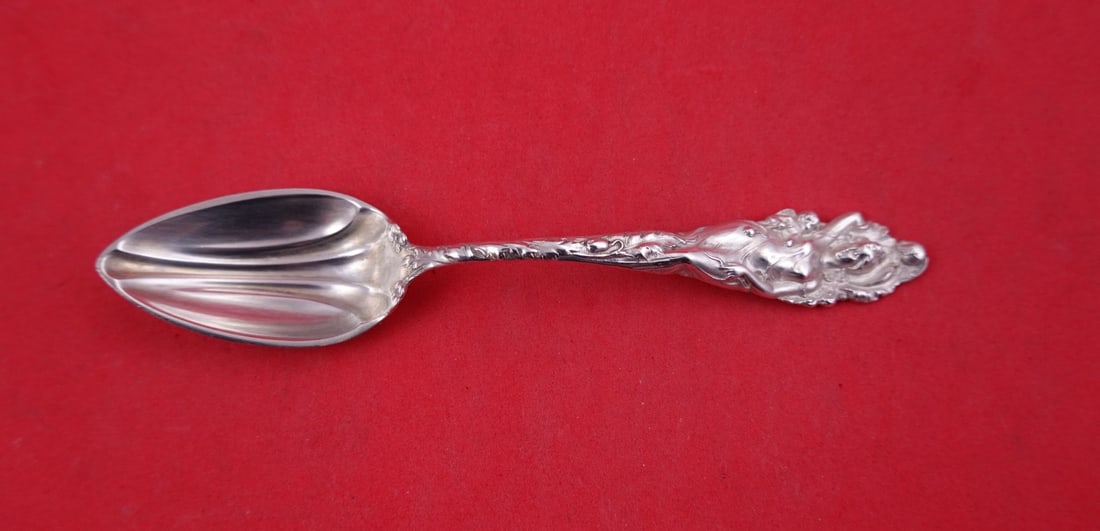 Reed and Barton Love Disarmed Sterling Silver Grapefruit Spoon 6 Inch: Reed and Barton Love Disarmed Sterling Silver Grapefruit Spoon 6 Inch A Reed & Barton grapefruit spoon in the Love Disarmed pattern, made of sterling silver. This Art Nouveau style piece is post-1940 