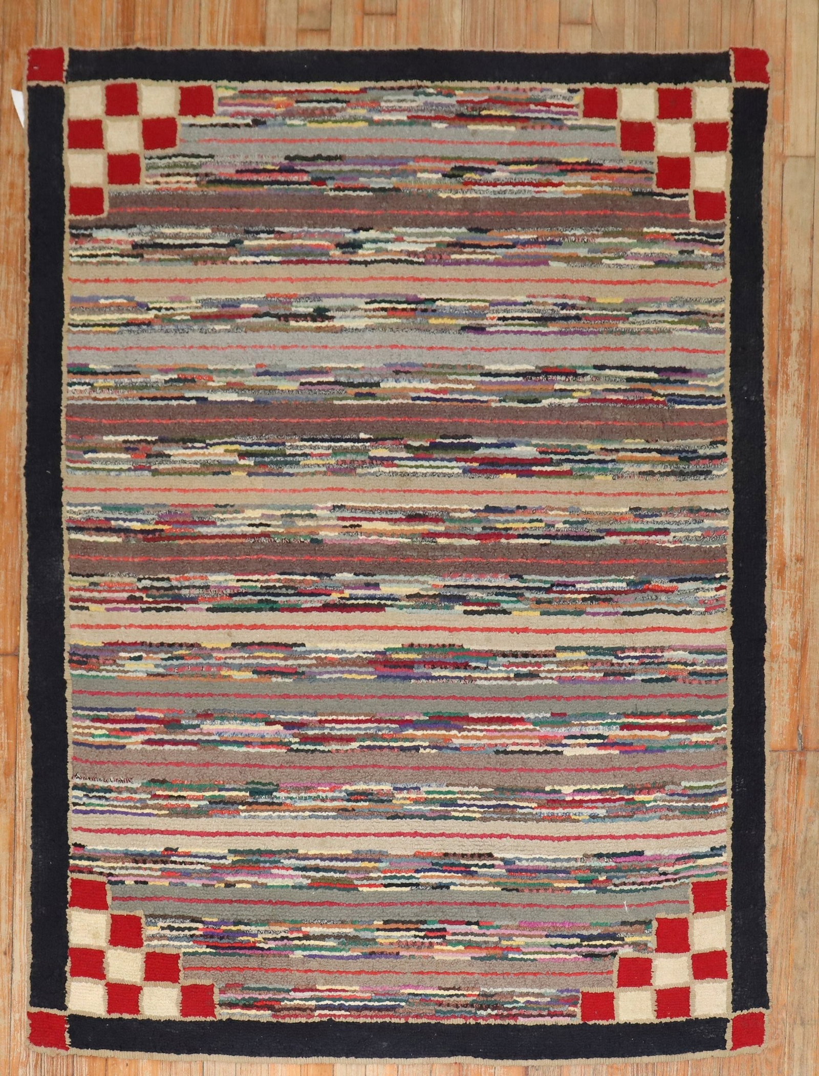 4' 4" x 5' 9" American hooked accent rug: 4' 4" x 5' 9" American hooked accent rug American hooked accent rug dating to the second quarter of the 20th century. This pre-owned piece features a hooked construction and classic accent rug format.