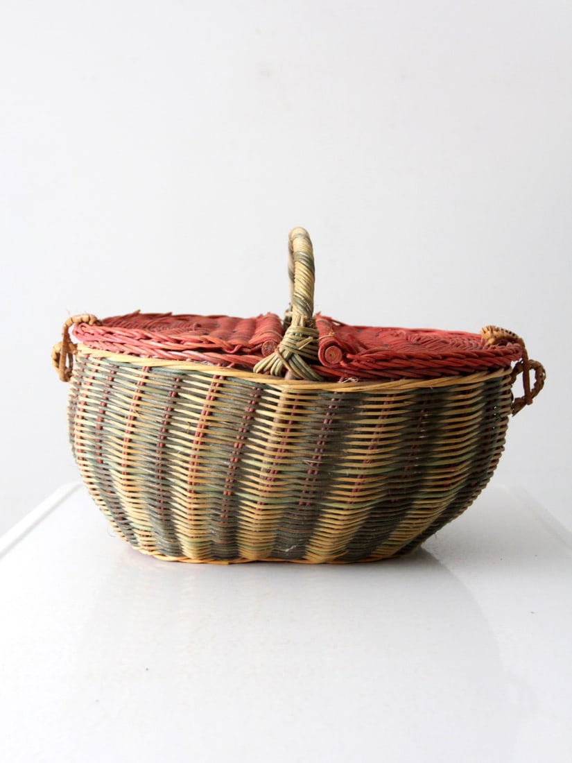 Vintage Watermelon Wicker Picnic Basket 18x15x13 Inch: Vintage Watermelon Wicker Picnic Basket 18x15x13 Inch This charming vintage wicker picnic basket is designed in the shape of a watermelon, featuring a green and cream striped base with a vibrant red l