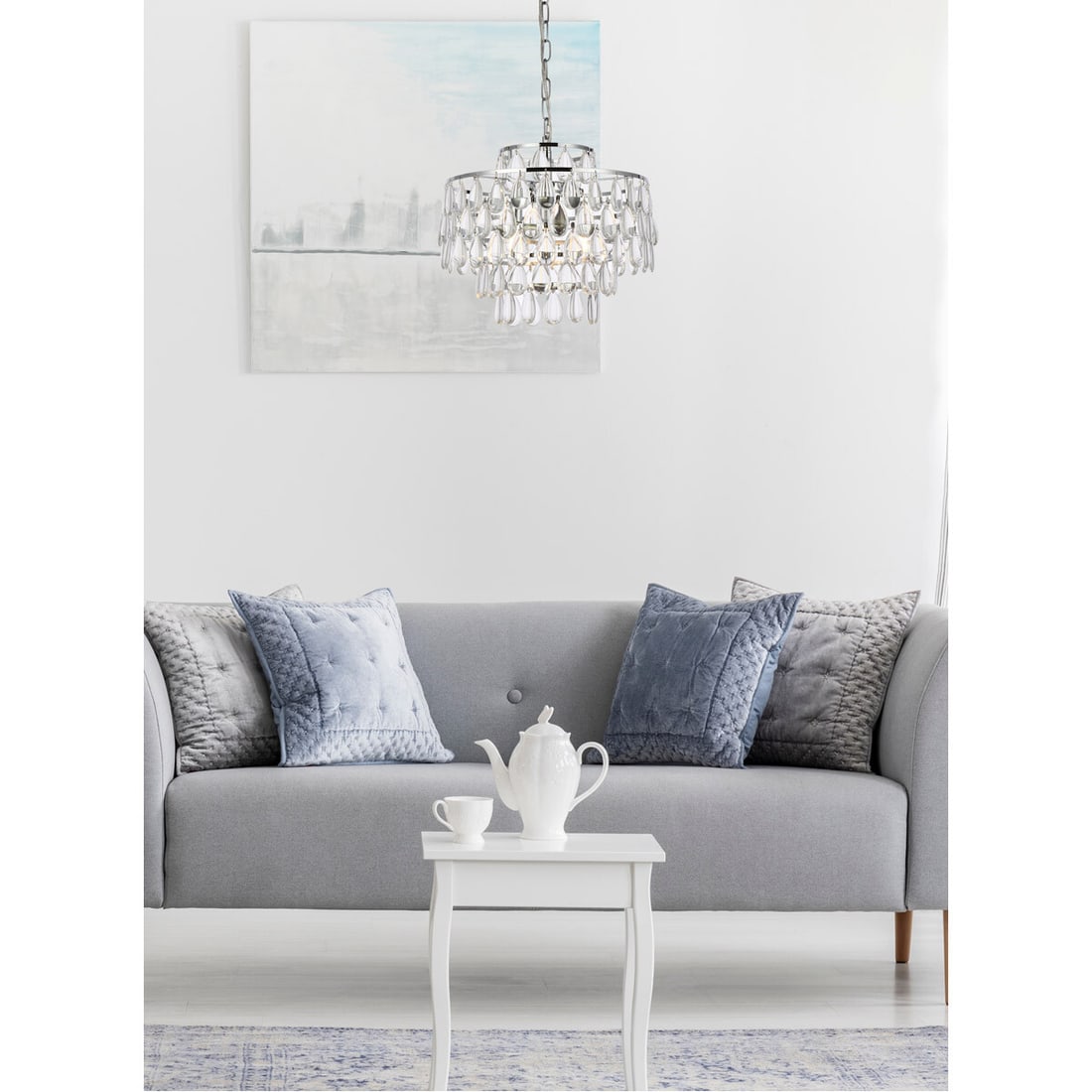 Living District Mila 3-Light Chrome Crystal Pendant: Living District Mila 3-Light Chrome Crystal Pendant This modern chandelier features three lights with adjustable hanging height, designed with clear glass or crystal drops for a sophisticated look. Th