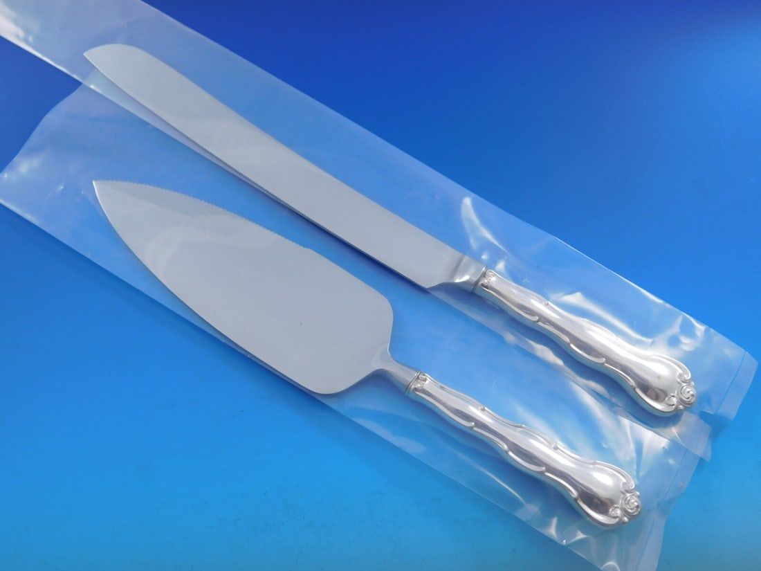 2 Piece Sterling Wedding Cake Set Gorham Rondo Knife and Server: 2 Piece Sterling Wedding Cake Set Gorham Rondo Knife and Server Custom made 2-piece wedding cake set in the Gorham Rondo pattern. This pre-owned set includes a wedding cake knife and cake server with 