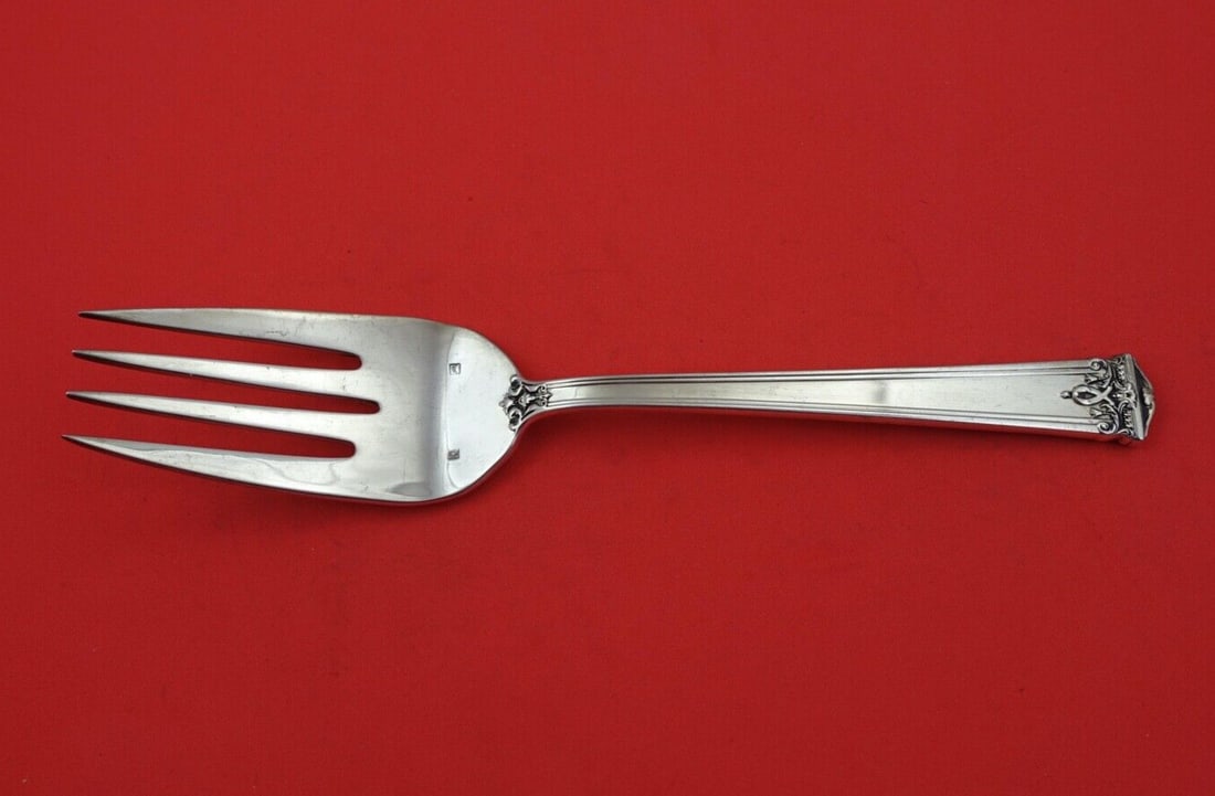 Tuttle Trianon Sterling Silver Cold Meat Fork 9 1/8 Inch: Tuttle Trianon Sterling Silver Cold Meat Fork 9 1/8 Inch This Trianon cold meat fork by Tuttle is a stunning addition to any dining collection. Crafted from sterling silver, it measures 9 1/8 inches a