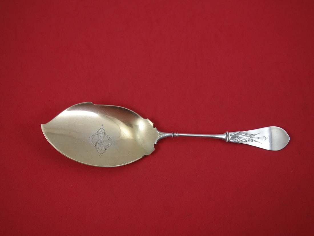 Gorham New Tipt Sterling Silver Ice Cream Server Goldwashed 9 3/8: Gorham New Tipt Sterling Silver Ice Cream Server Goldwashed 9 3/8 Sterling silver ice cream server in the New Tipt pattern by Gorham. It features a flat handle, goldwashed finish, and a monogrammed bl