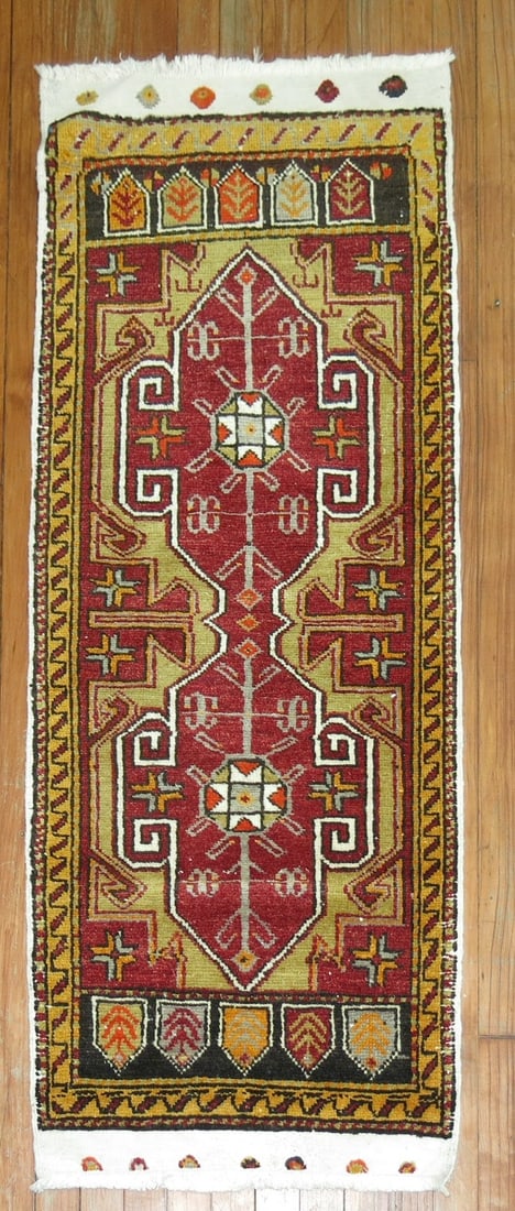 1' 10" x 4' 7" Anatolian Turkish Yastik runner rug: 1' 10" x 4' 7" Anatolian Turkish Yastik runner rug Vintage Turkish yastik rug in a small runner format with an intricate geometric pattern. This pre-owned Anatolian piece offers a traditional decorati