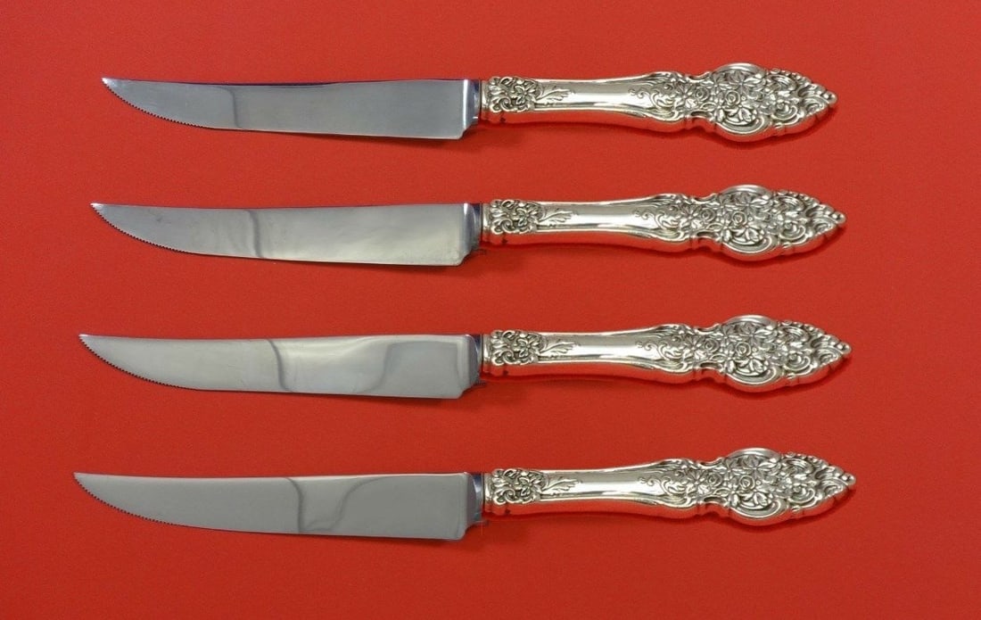 Reed and Barton Vienna Sterling Silver Steak Knife Set 4pc Custom 8 1/2": Reed and Barton Vienna Sterling Silver Steak Knife Set 4pc Custom 8 1/2" Enhance your dining experience with this exquisite 4-piece steak knife set from the prestigious Reed and Barton, featuring the 