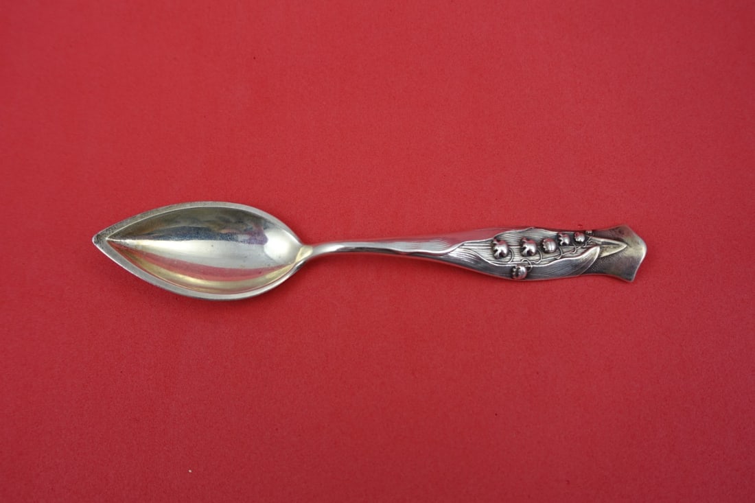 Sterling Silver Grapefruit Spoon Flora Pattern by Shiebler with Lily of the Valley: Sterling Silver Grapefruit Spoon Flora Pattern by Shiebler with Lily of the Valley This is a Shiebler Sterling Silver grapefruit spoon in the Flora pattern, featuring a lily of the valley motif. It is