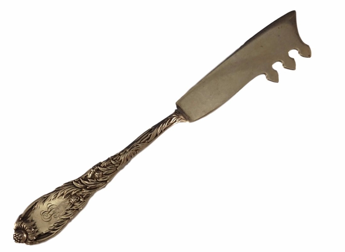 Sterling Silver Cheese Knife with Pick Chrysanthemum Pattern by Tiffany & Co: Sterling Silver Cheese Knife with Pick Chrysanthemum Pattern by Tiffany & Co This is a Tiffany & Co. Chrysanthemum pattern sterling silver flat handle cheese knife with pick, crafted in the United Sta