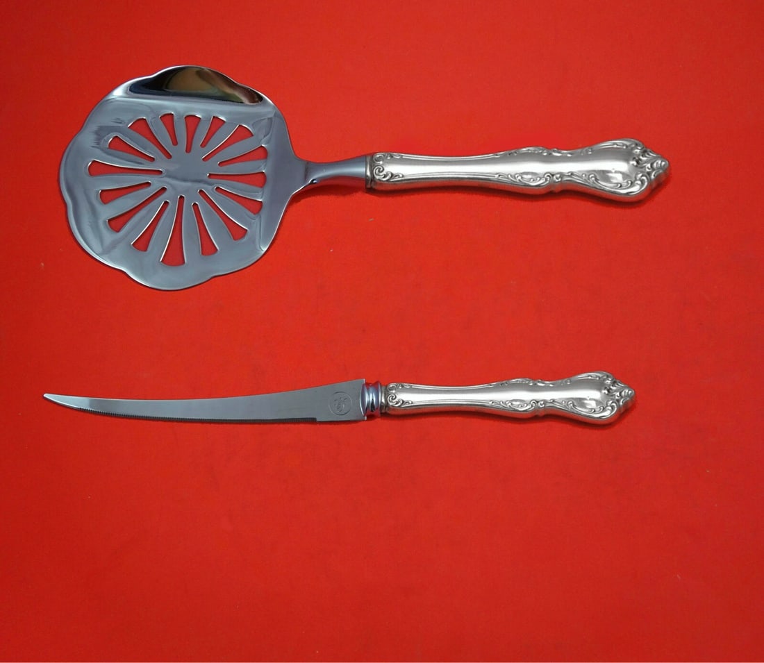 Towle Debussy 2-Piece Sterling Silver Tomato Server Knife Set: Towle Debussy 2-Piece Sterling Silver Tomato Server Knife Set This is a 2-piece Debussy by Towle hostess set in sterling silver, custom made with hollow handles and stainless steel implements. The set