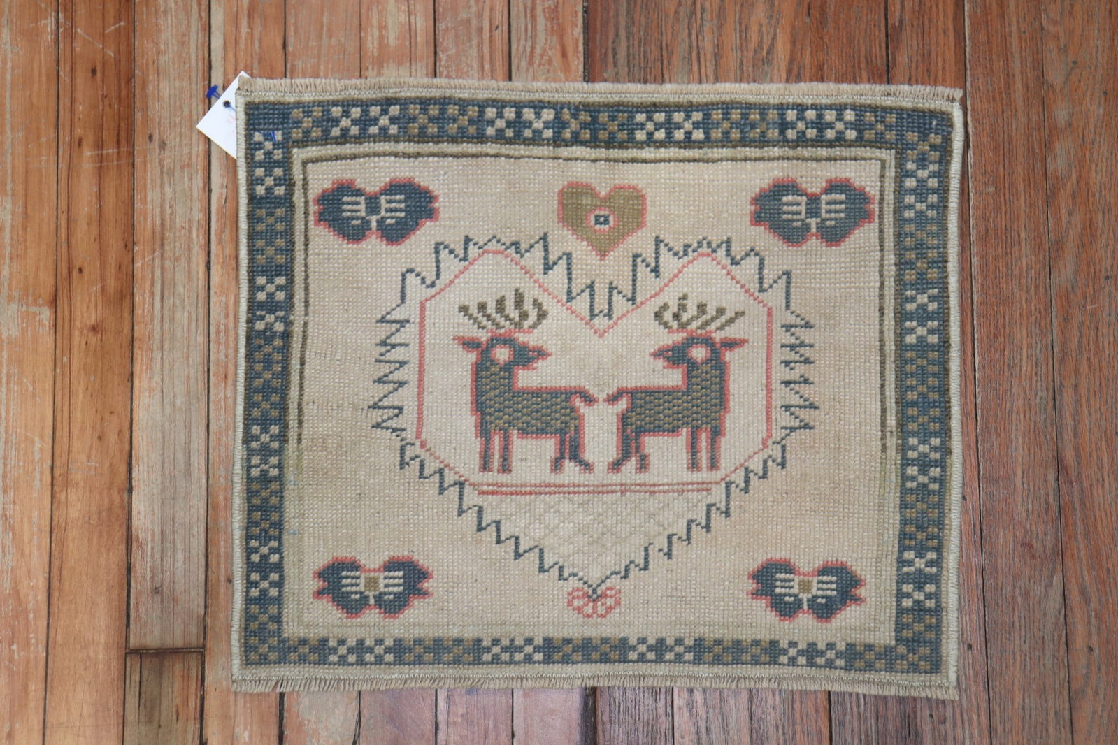 1' 6" x 1' 10" Turkish Anatolian pictorial Yastik rug: 1' 6" x 1' 10" Turkish Anatolian pictorial Yastik rug Turkish Anatolian pictorial mini square rug in a Yastiks category design. The decorative motif features two deer within a heart-shaped composition