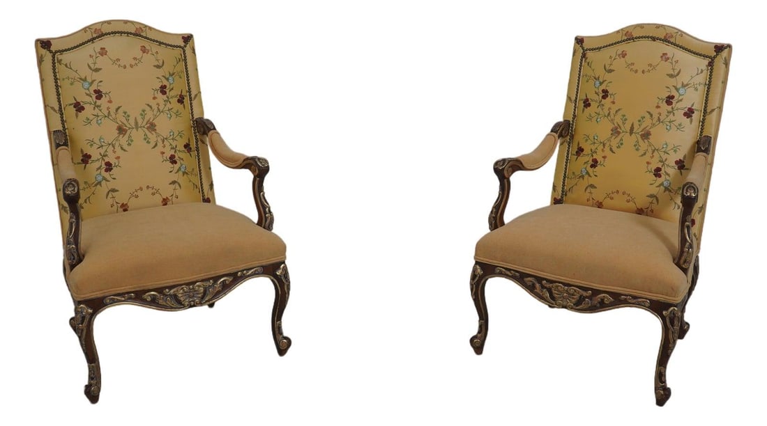 Set of Two Giltwood Armchairs in Louis XV Design with New Upholstery: Set of Two Giltwood Armchairs in Louis XV Design with New Upholstery This pair of Louis XV style armchairs features finely carved giltwood frames with Queen Anne legs and pad feet. The chairs display 