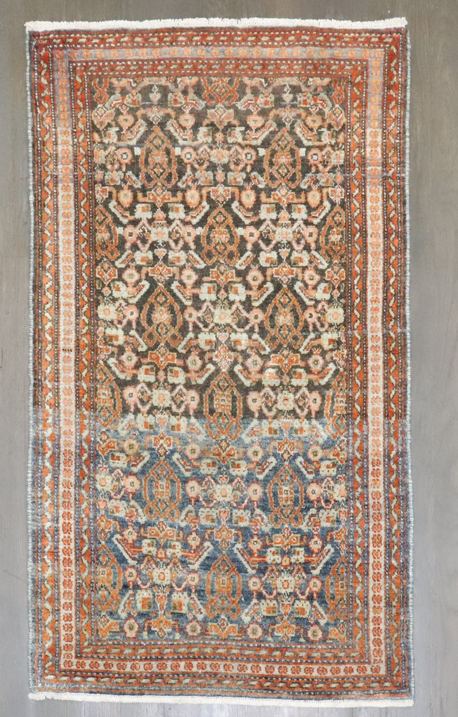 1' 10" x 3' 2" Persian Senneh Rug: 1' 10" x 3' 2" Persian Senneh Rug Early 20th-century Persian Senneh rug with a compact format. This pre-owned piece is identified as a Senneh and is listed within the pairs and yastiks category. Speci