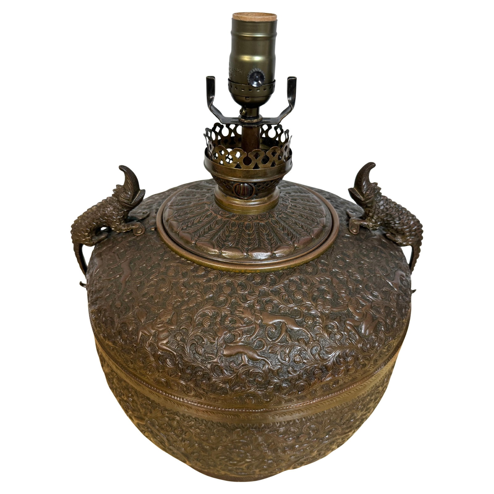 Electrified Anglo-Indian Brass Lamp with Alligator Handles 17": Electrified Anglo-Indian Brass Lamp with Alligator Handles 17" Illuminate your space with this stunning Exotic Anglo-Indian Repousse Oil Lamp, now electrified for modern use. Crafted in India circa 18
