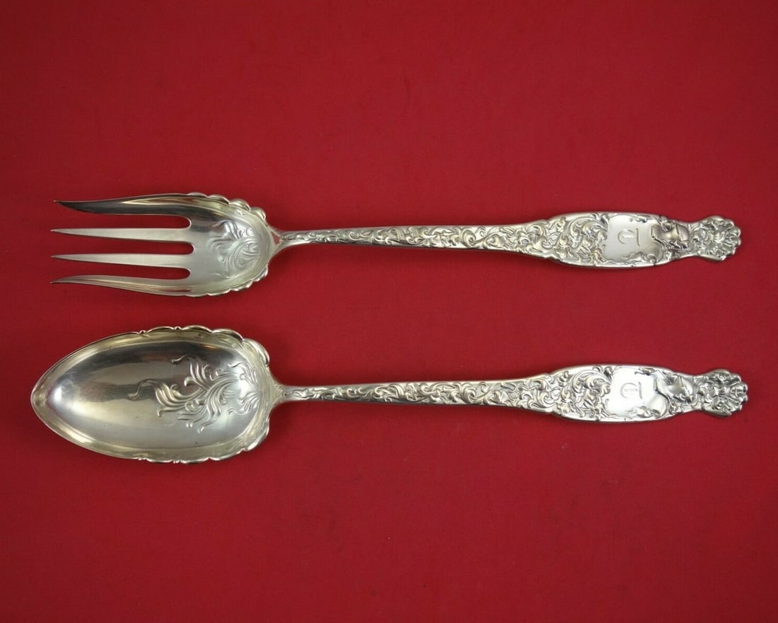 Whiting Heraldic Sterling Silver Salad Serving Set 2pc 12 Inch Scalloped: Whiting Heraldic Sterling Silver Salad Serving Set 2pc 12 Inch Scalloped This exquisite two-piece salad serving set, crafted in sterling silver, features the elegant Heraldic pattern by Whiting, datin