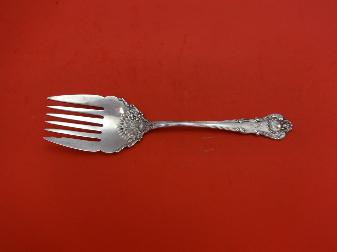 Durgin New Queens sterling silver serving fork beef 5 tine 6 3/8": Durgin New Queens sterling silver serving fork beef 5 tine 6 3/8" Sterling silver beef fork in the New Queens pattern by Durgin. This pre-owned serving piece is monogrammed, with monograms that vary, 
