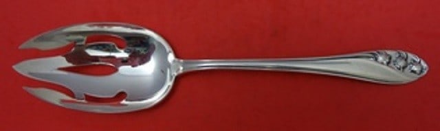 Gorham Lily of the Valley Sterling Silver Slotted Serving Spoon 8.5": Gorham Lily of the Valley Sterling Silver Slotted Serving Spoon 8.5" This exquisite serving spoon features the iconic Lily of the Valley pattern by Gorham, crafted from high-quality sterling silver. M