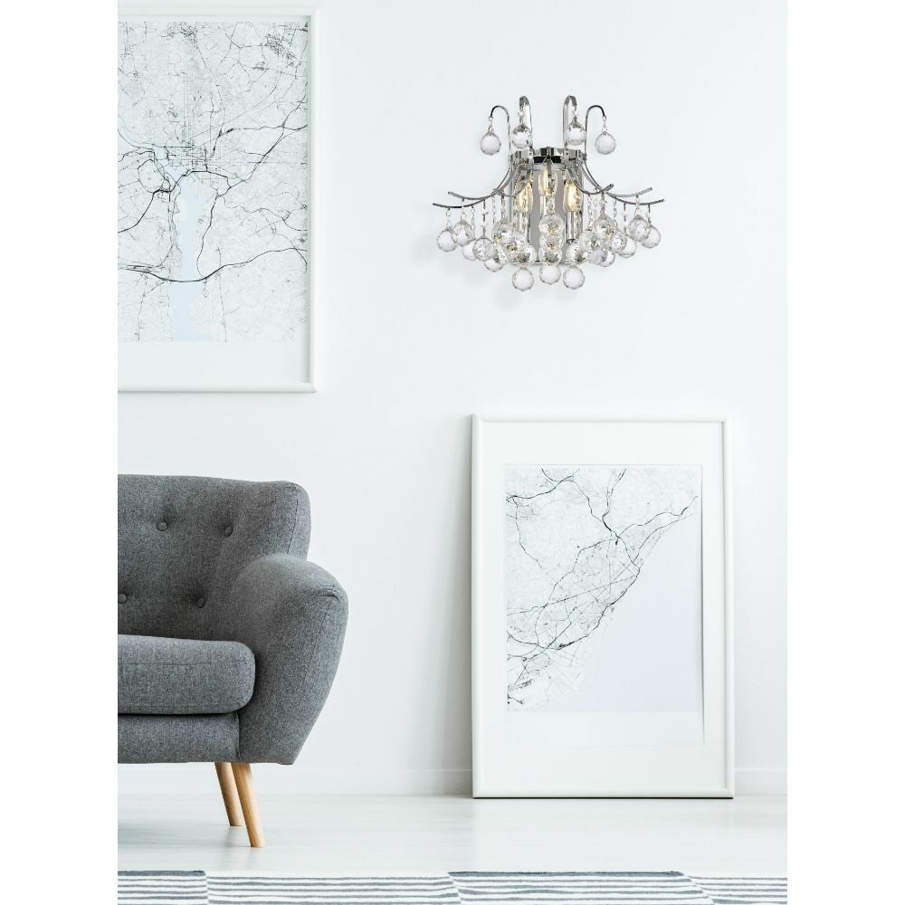 Toureg Chrome Crystal 3 Light Wall Sconce 16 Inch: Toureg Chrome Crystal 3 Light Wall Sconce 16 Inch This modern wall sconce features a polished chrome finish and high-quality royal cut crystals, designed to add a touch of elegance to any indoor space