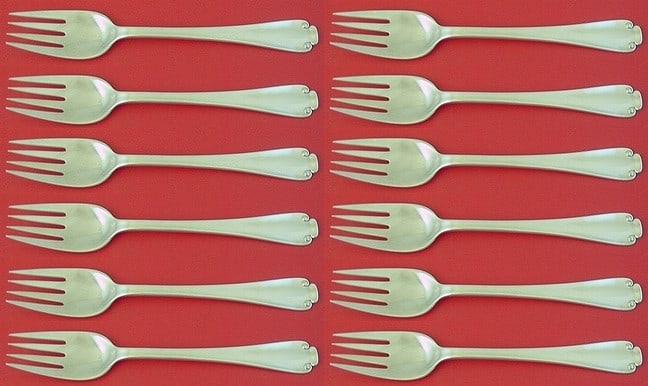 Tiffany & Co. Flemish Sterling Silver Fish Fork Set of 12: Tiffany & Co. Flemish Sterling Silver Fish Fork Set of 12 Enhance your dining experience with this exquisite set of 12 fish forks from the Flemish pattern by Tiffany & Co. Crafted from high-quality st