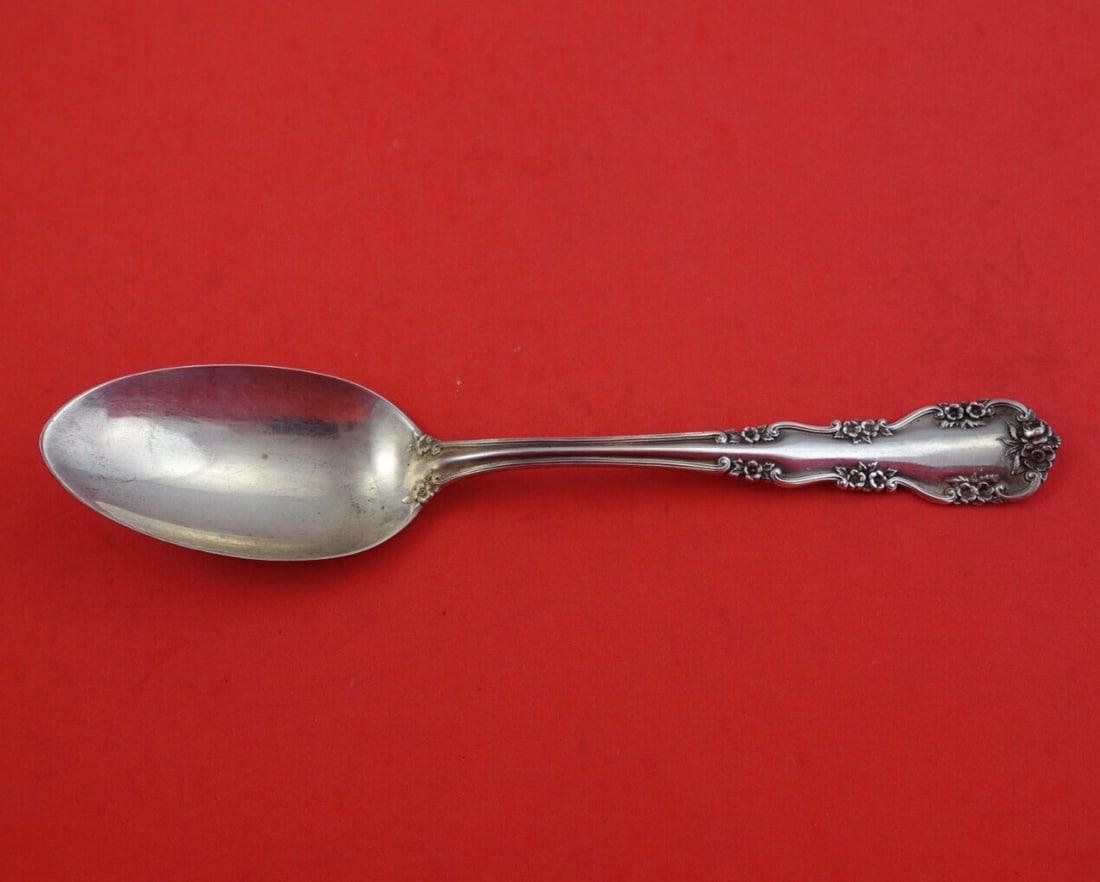 International Sterling Silver Serving Spoon Wild Rose Old 8 1/4 inch: International Sterling Silver Serving Spoon Wild Rose Old 8 1/4 inch This exquisite serving spoon from the Wild Rose Old pattern, also known as Rosalind Old, is crafted by International Sterling. Made