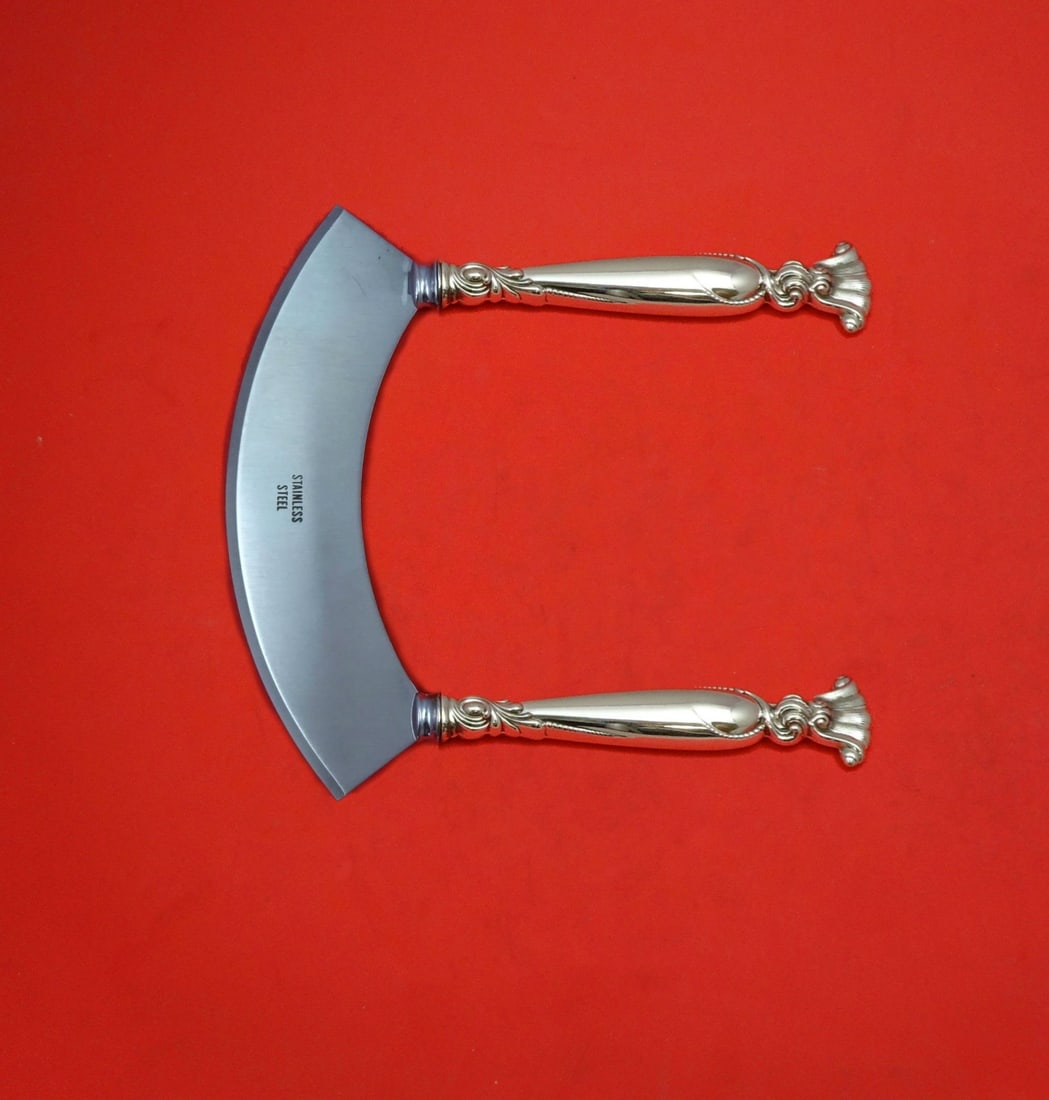 Wallace Romance of the Sea Sterling Silver Mezzaluna Knife Custom Made 6 1/4": Wallace Romance of the Sea Sterling Silver Mezzaluna Knife Custom Made 6 1/4" Introducing the Romance of the Sea Mezzaluna Knife by Wallace, a stunning custom-made kitchen tool that combines functiona