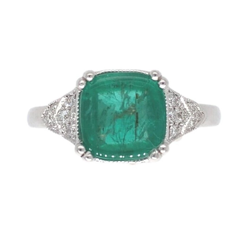 18k White Gold Deco Emerald Diamond Ring 2.23 Carat Size 6.5 GIA Certified: 18k White Gold Deco Emerald Diamond Ring 2.23 Carat Size 6.5 GIA Certified This exquisite 18k white gold ring showcases a stunning genuine natural emerald weighing 2.23 carats, complemented by 14 spar