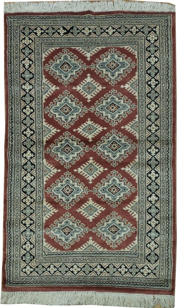 Luxurious 3'2 x 5' Wool Silk Bokhara Rug with Bold Patterns: Luxurious 3'2 x 5' Wool Silk Bokhara Rug with Bold Patterns Free continental US Shipping Elevate your living space with this exquisite 3.2 x 5.0 red wool and silk Bokhara rug. This stunning piece feat