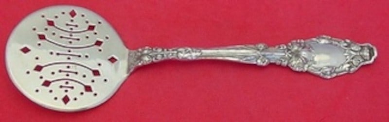 Gorham Virginiana Sterling Silver Pierced Cucumber Server 7 1/8": Gorham Virginiana Sterling Silver Pierced Cucumber Server 7 1/8" Sterling silver cucumber server in the Virginiana pattern by Gorham. This pierced serving piece features a diamond design, measures 7 1