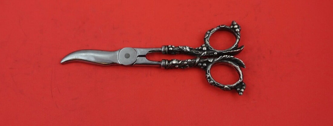 Heavy Sterling Silver Grape Shears with Grape Motif 6.5 Inches: Heavy Sterling Silver Grape Shears with Grape Motif 6.5 Inches These elegant grape shears are crafted from high-quality sterling silver and feature a distinctive grape motif, making them a beautiful a