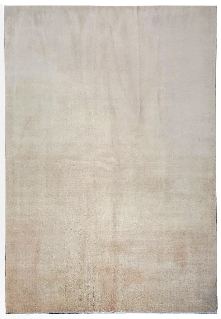 5' x 8' Vanilla White Handmade Modern Loom Knotted Rug: 5' x 8' Vanilla White Handmade Modern Loom Knotted Rug Free continental US Shipping Introduce warmth and sophistication to your home with the 5' x 8' Vanilla White Modern Loom Knotted Rug. This exquis