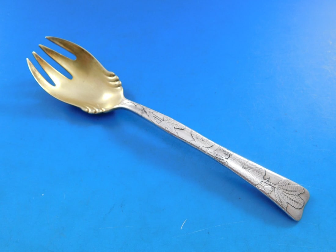 Tiffany Sterling Silver Lap Over Edge Ice Cream Fork Sensitive Plant Motif: Tiffany Sterling Silver Lap Over Edge Ice Cream Fork Sensitive Plant Motif This exquisite ice cream fork from Tiffany & Co. features the elegant Lap Over Edge pattern, showcasing a beautiful sensitive