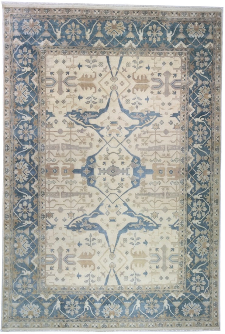 Oversized 12'2 x 17'11 Hand-Knotted Wool Oushak Area Rug Floral Design: Oversized 12'2 x 17'11 Hand-Knotted Wool Oushak Area Rug Floral Design This oversized hand-knotted Oushak rug features a floral pattern in muted tones of cream, steel blue, beige, and tan. Crafted fro