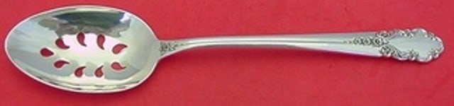 International Sterling Silver Bridal Veil Slotted Serving Spoon 9-Hole Custom: International Sterling Silver Bridal Veil Slotted Serving Spoon 9-Hole Custom This exquisite serving spoon, part of the Bridal Veil pattern by International, showcases a beautifully pierced design wit
