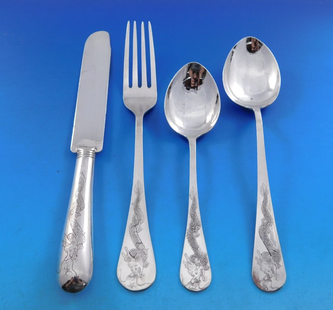 Hand Engraved Dragon Japanese 950 Silver 24-Piece Flatware Service with Caddy: Hand Engraved Dragon Japanese 950 Silver 24-Piece Flatware Service with Caddy This Japanese 950 sterling silver flatware set includes 24 pieces crafted before 1928. Each piece features hand-engraved d