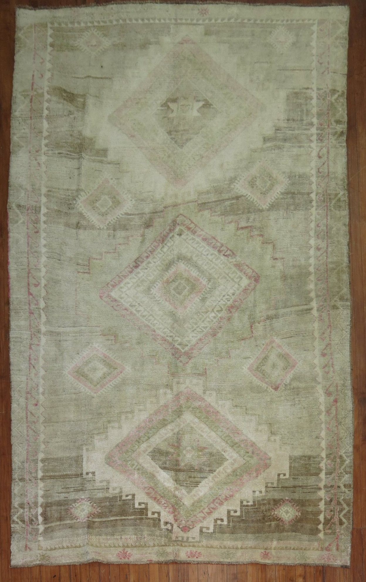 6' 8" x 11' 2" Geometric Turkish Kars Gallery Rug: 6' 8" x 11' 2" Geometric Turkish Kars Gallery Rug Vintage Turkish Kars gallery rug with a geometric design from the mid-20th century. This pre-owned rug features the classic Kars style and is presente