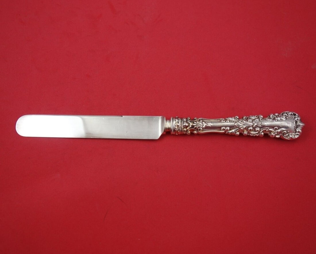 International Sterling Silver Avalon Dinner Knife Blunt 10 3/8": International Sterling Silver Avalon Dinner Knife Blunt 10 3/8" Presenting the Avalon dinner knife from International Sterling, crafted with a hollow handle and a blunt blade, measuring 10 3/8". This 