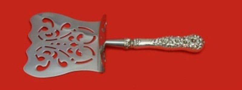 Dominick Haff Rococo Sterling Silver Asparagus Server 9 1 2 inch: Dominick Haff Rococo Sterling Silver Asparagus Server 9 1 2 inch This Rococo asparagus server by Dominick & Haff features a sterling silver hollow handle with a stainless steel implement. Custom made 