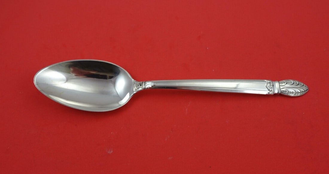 Reed and Barton Colonial Classic Sterling Silver Serving Spoon 8 3/8": Reed and Barton Colonial Classic Sterling Silver Serving Spoon 8 3/8" Discover the elegance of the Colonial Classic serving spoon by Reed & Barton, crafted from high-quality sterling silver. This exqu