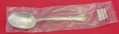 Reed & Barton Rose Cascade Gold Sterling Silver Serving Spoon 8.5": Reed & Barton Rose Cascade Gold Sterling Silver Serving Spoon 8.5" This exquisite serving spoon from Reed & Barton features the elegant Rose Cascade Gold pattern. Made of sterling silver, it is 8 1/2 