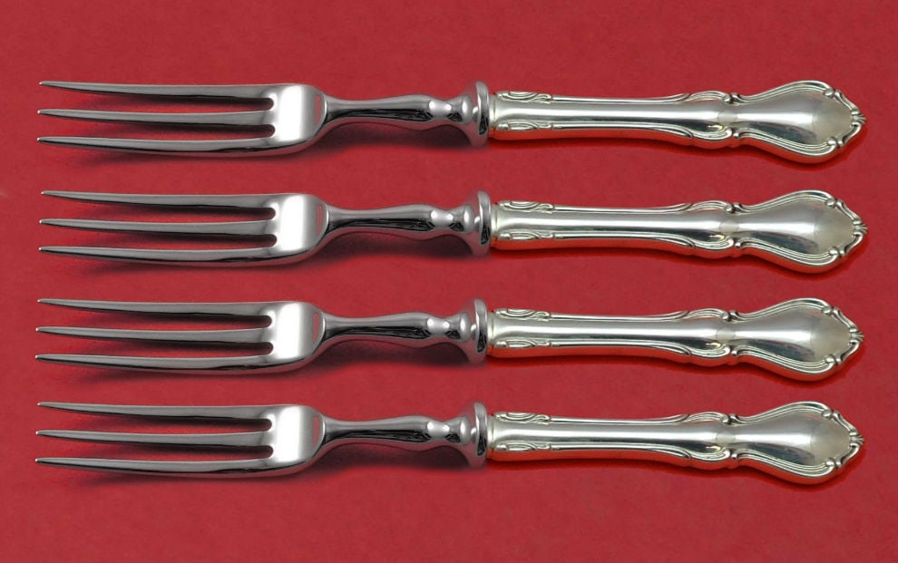 4 Piece Sterling Fruit Fork Set Reed and Barton Hampton Court Custom: 4 Piece Sterling Fruit Fork Set Reed and Barton Hampton Court Custom A 4-piece individual fruit fork set in the Hampton Court pattern by Reed & Barton. These forks are crafted in sterling silver with 