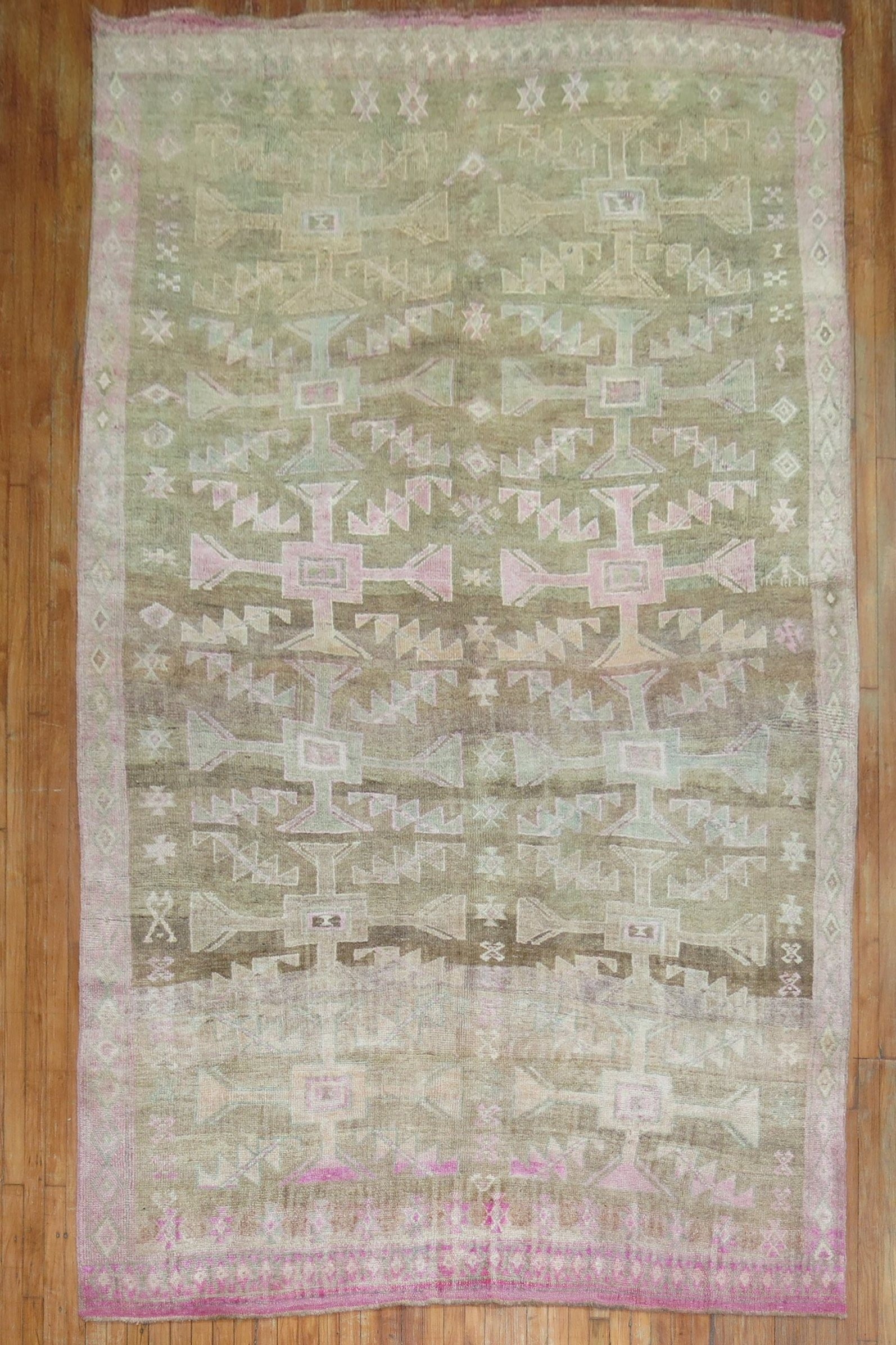 7' 2" x 12' Turkish Kars rug in pink and brown: 7' 2" x 12' Turkish Kars rug in pink and brown Vintage Turkish Kars rug in pink and brown with a geometric pattern. This mid-20th century piece is a pre-owned area rug suited for gallery or room use. 