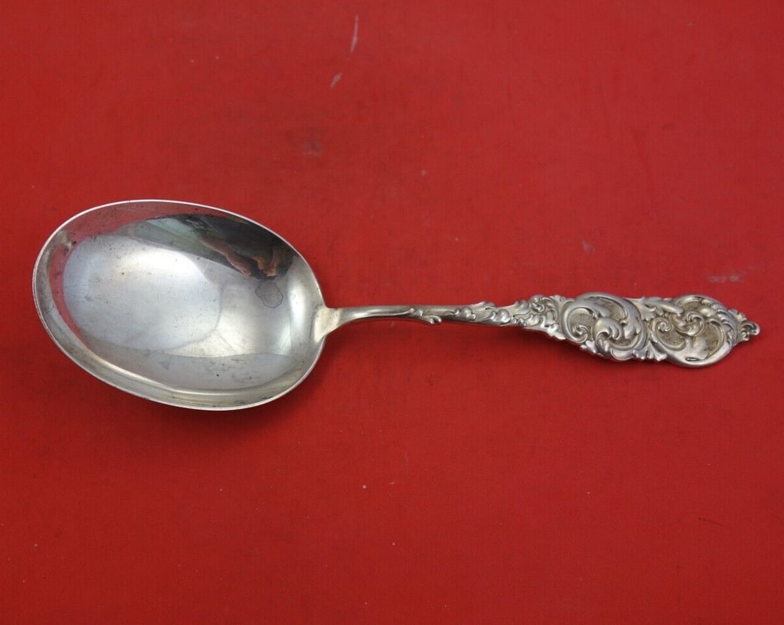 Amston Gladstone Sterling Silver Vegetable Serving Spoon 8 7/8": Amston Gladstone Sterling Silver Vegetable Serving Spoon 8 7/8" This exquisite Gladstone vegetable serving spoon by Amston is crafted from high-quality sterling silver, measuring 8 7/8 inches in lengt