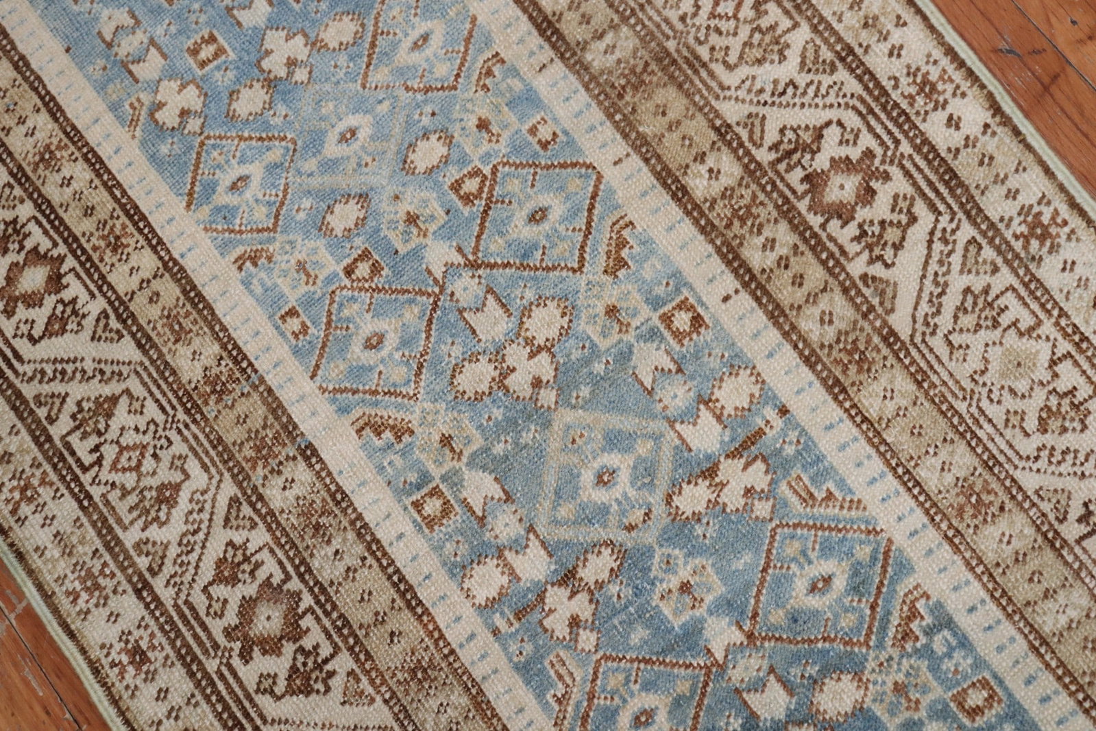 2' 7" x 14' 8" Malayer Persian Runner Blue Ivory Brown: 2' 7" x 14' 8" Malayer Persian Runner Blue Ivory Brown Persian Malayer runner from the 1930s featuring a soft blue field with ivory and brown accents. This pre-owned runner presents a classic geometri
