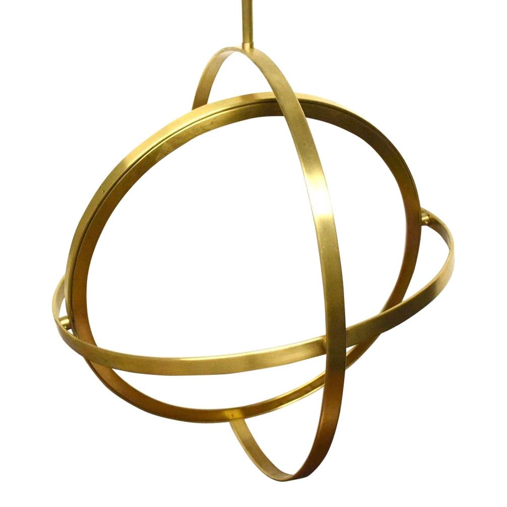 Visual Comfort Modern Brass Adjustable Rotating Pendant Light: Visual Comfort Modern Brass Adjustable Rotating Pendant Light Illuminate your space with this stunning modern brass rotating pendant light. Featuring an adjustable height, this piece combines function