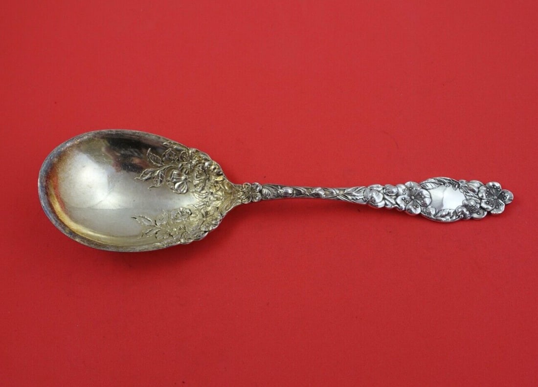 Dominick & Haff Blossom Sterling Silver Berry Spoon 8 3/4 inch Gold Wash: Dominick & Haff Blossom Sterling Silver Berry Spoon 8 3/4 inch Gold Wash Introducing the Blossom pattern Berry Spoon by Dominick and Haff, crafted from high-quality sterling silver. This exquisite ser