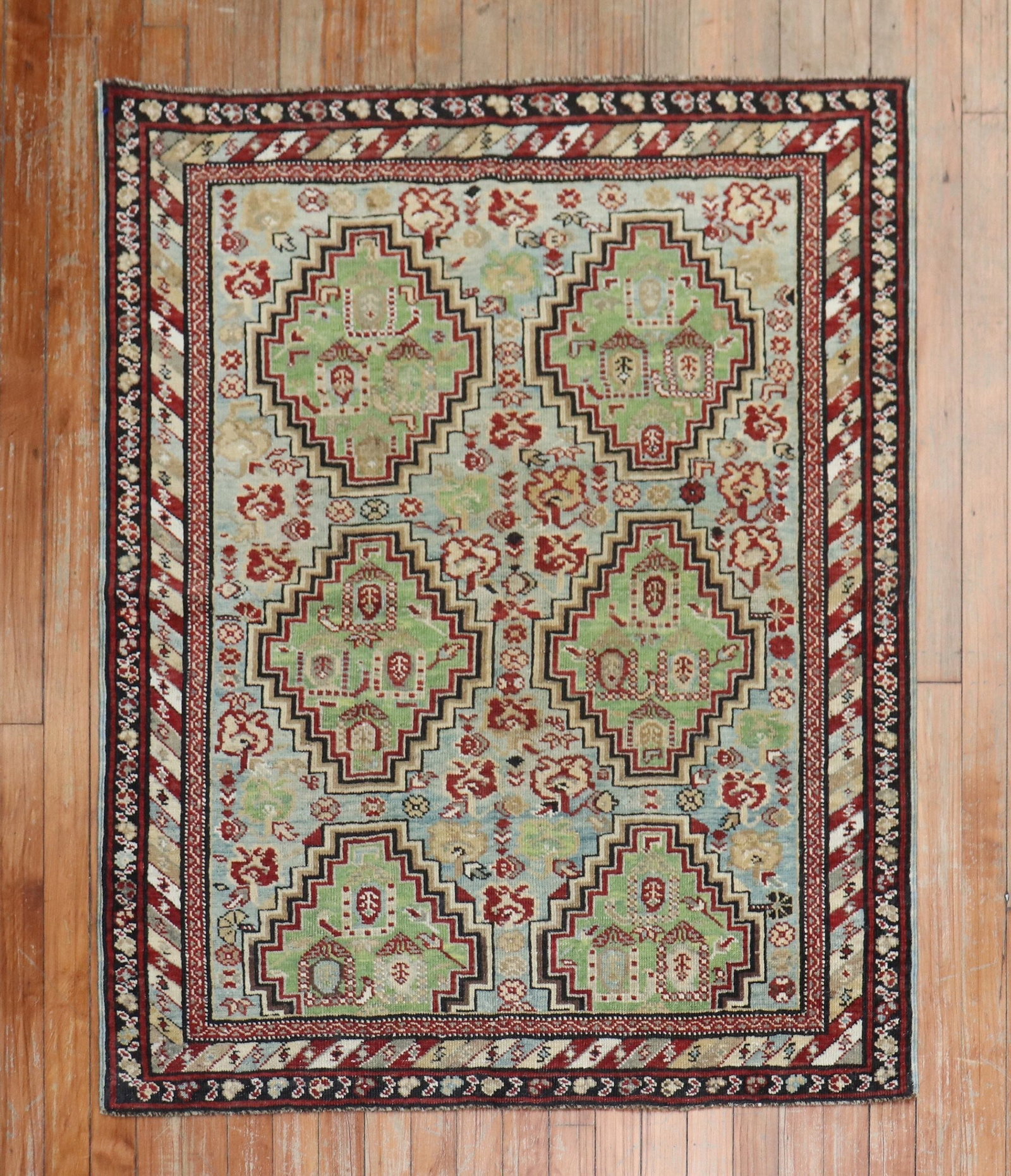 3' 4" x 4' 3" Antique Caucasian Baku Khila Rug: 3' 4" x 4' 3" Antique Caucasian Baku Khila Rug Late 19th century antique Caucasian Baku Khila rug featuring six light green medallions, including two half medallions, on a light blue field with a mult