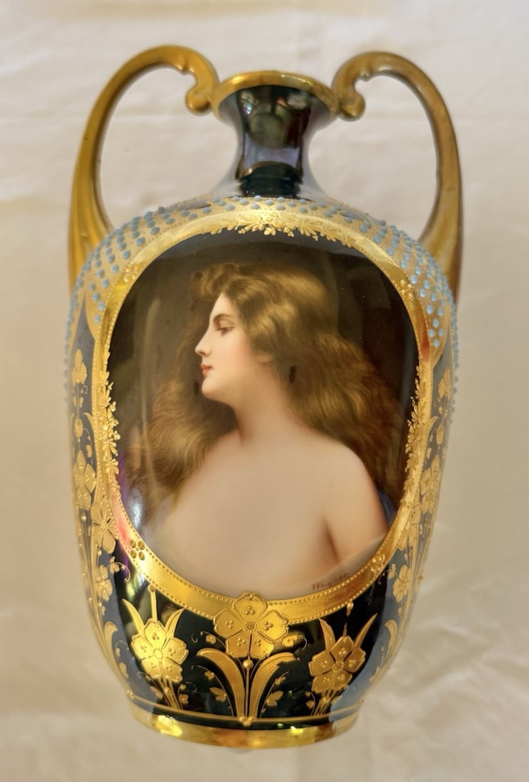 Austrian Royal Vienna Porcelain Urn Hand Painted Enameled Wagner Signed 19th Century: Austrian Royal Vienna Porcelain Urn Hand Painted Enameled Wagner Signed 19th Century This 19th-century Austrian Royal Vienna urn is crafted from hand-painted porcelain and features detailed enameling.