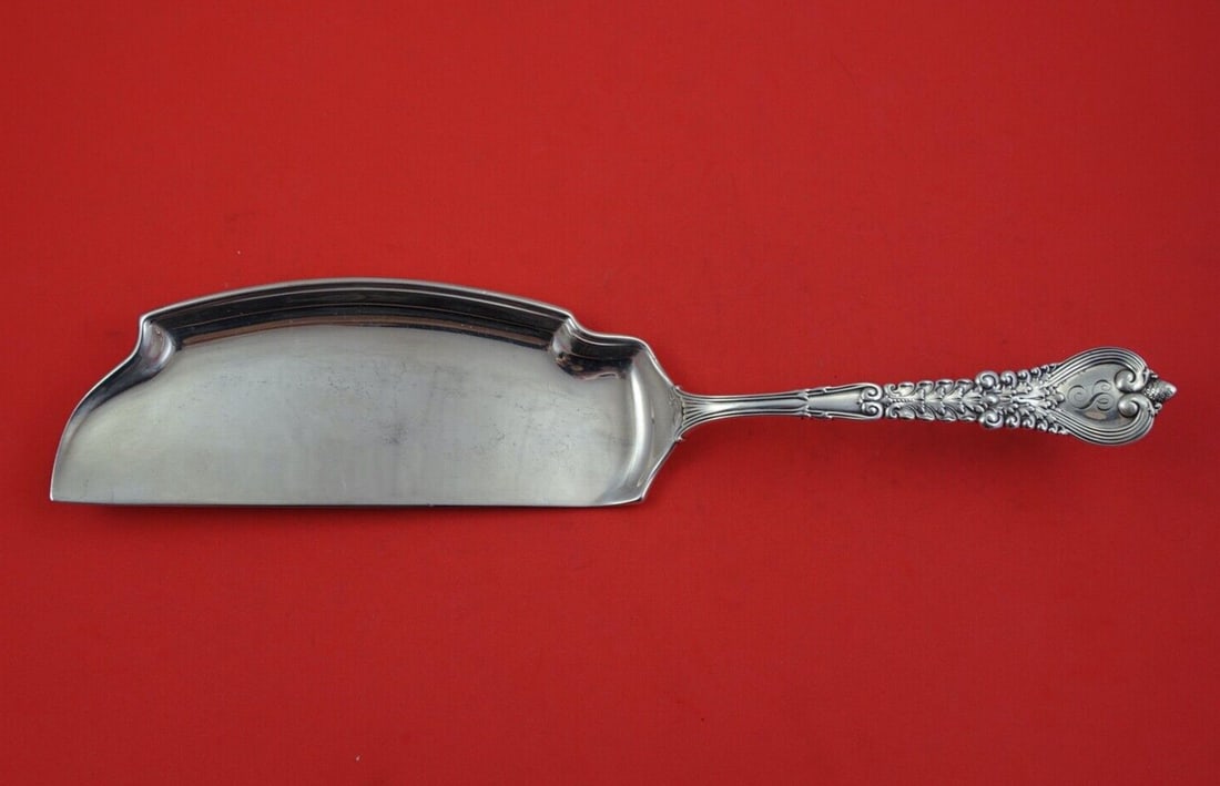 Tiffany & Co Florentine Sterling Silver 12 Crumber Heirloom: Tiffany & Co Florentine Sterling Silver 12 Crumber Heirloom This exquisite 12" Crumber, designed in the iconic Florentine pattern by Tiffany & Co., exemplifies timeless elegance and craftsmanship. Mad