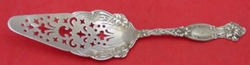 International Frontenac Sterling Silver Pierced Jelly Cake Server 8 1/8": International Frontenac Sterling Silver Pierced Jelly Cake Server 8 1/8" International Frontenac sterling silver jelly cake server in the Frontenac pattern. This pierced serving piece measures 8 1/8 i