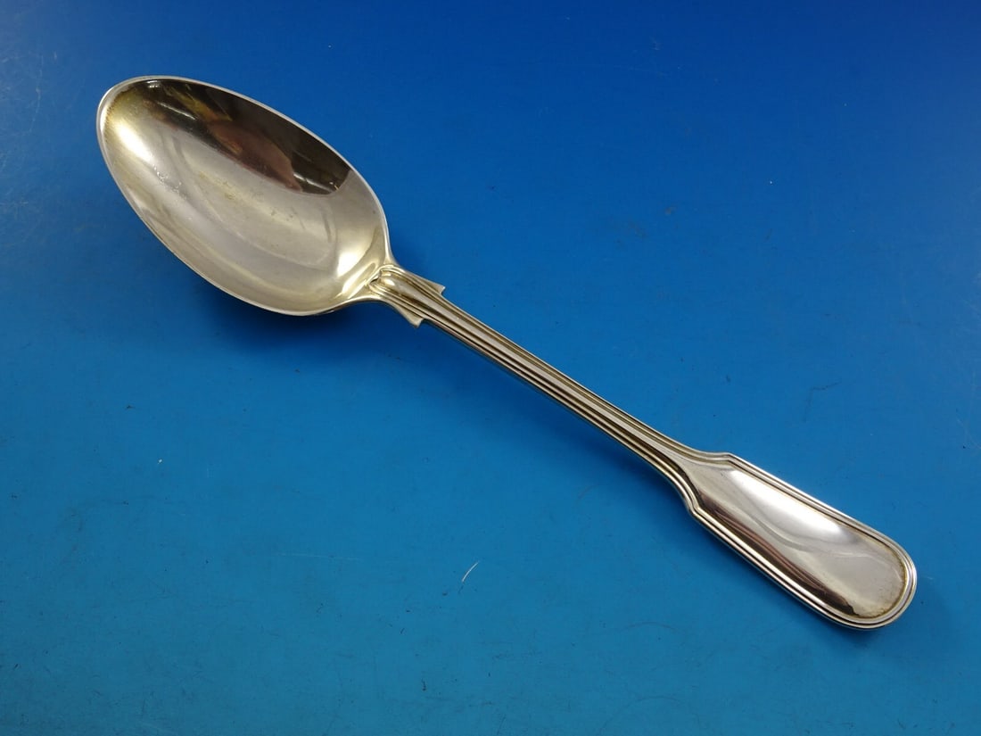 James Robinson Fiddle Thread Sterling Silver Soup Spoon 7 1/8: James Robinson Fiddle Thread Sterling Silver Soup Spoon 7 1/8 This exquisite Fiddle Thread place soup spoon by James Robinson features a beautifully turned up handle, showcasing the classic elegance o
