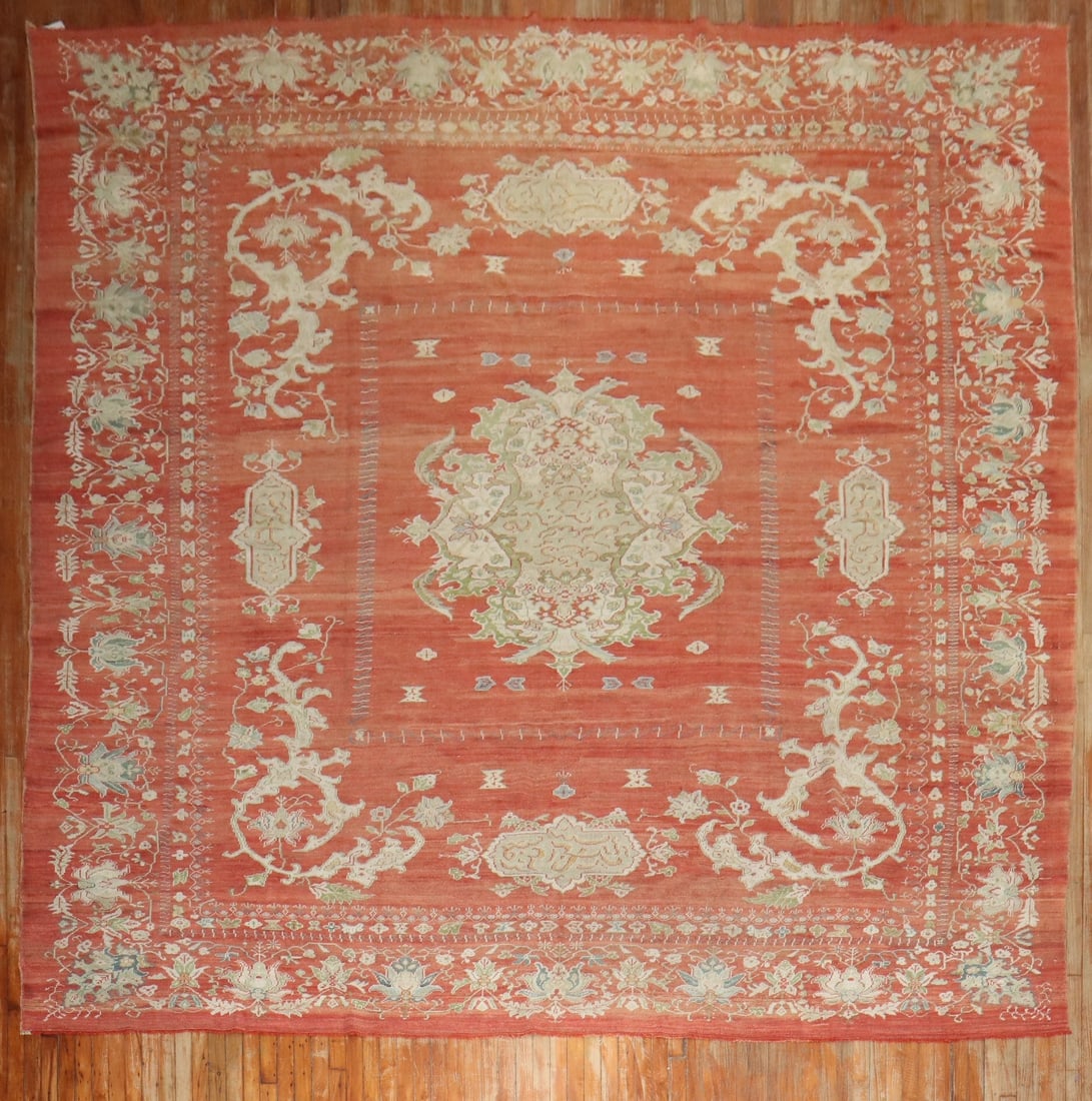 12' x 14' Antique Turkish Oushak Rug Soft Red Late 19th Century: 12' x 14' Antique Turkish Oushak Rug Soft Red Late 19th Century Late 19th century antique Turkish Oushak rug in a soft red palette. This large oversize square rug features an intricate floral pattern 
